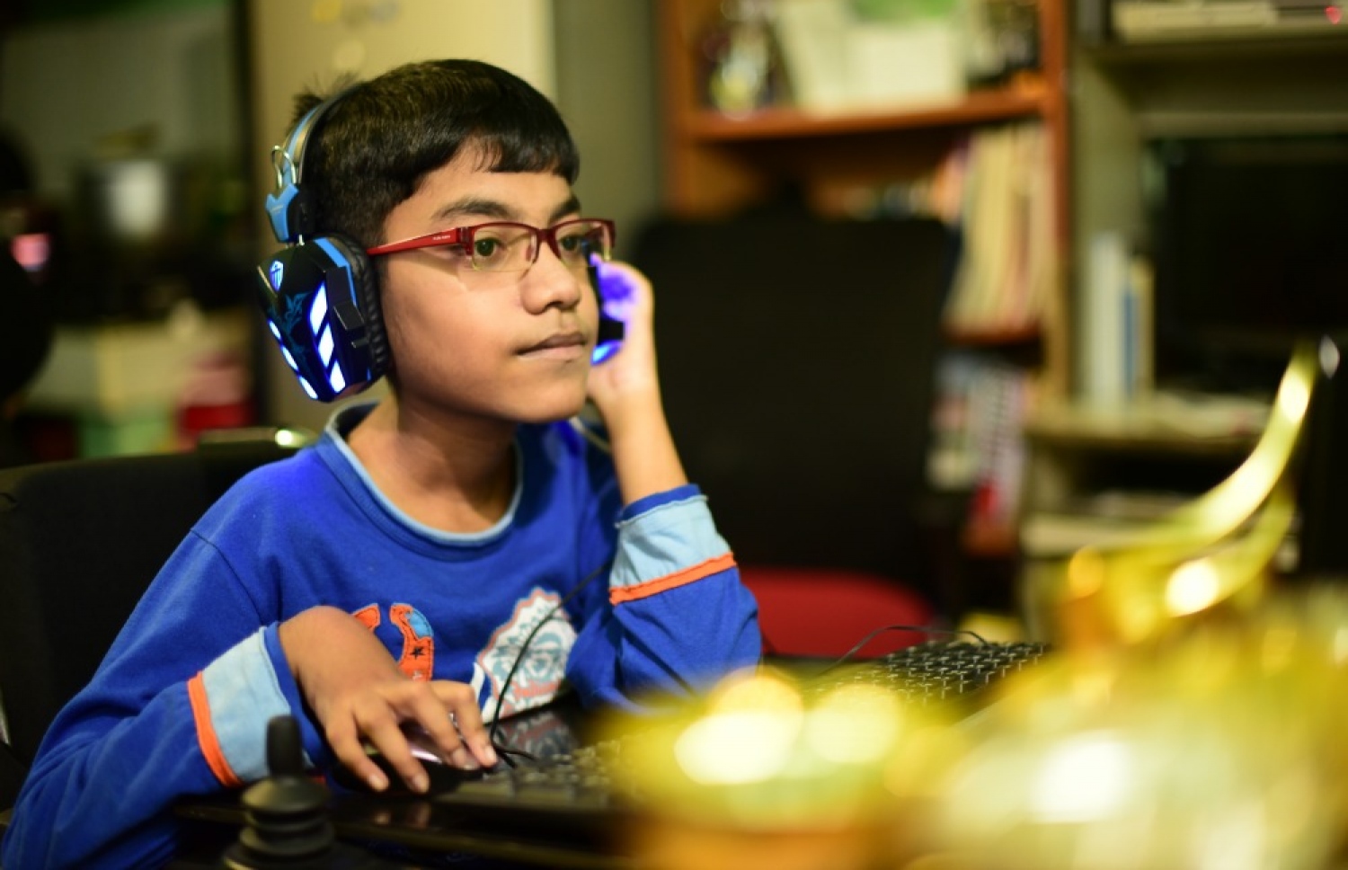 ރައިޝާން ގޭމް ކުޅެނީ: ކިޔެވުމަށް ވެސް ވަރަށް މޮޅު.---ފޮޓޯ: ހުސެއިން ޝަޔާހު/މިހާރު