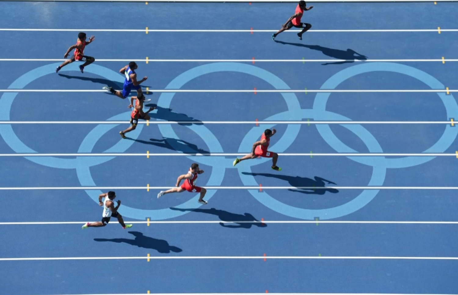 ރާއްޖޭގެ އެންމެ ބާރު ދުވުންތެރިޔާ ހަސަން ސާއިދު (ވ) އޮލިމްޕިކްސްގެ 100 މީޓަރު ޕްރިލިމިނަރީ ބުރުގައި ދުވަނީ. --ފޮޓޯ: އޭއެފްޕީ