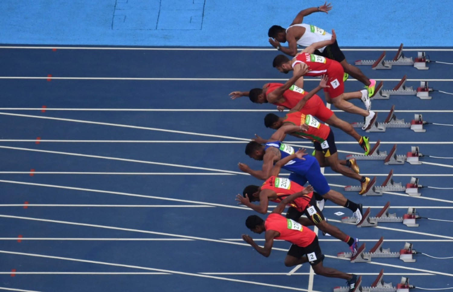 ރާއްޖޭގެ އެންމެ ބާރު ދުވުންތެރިޔާ ހަސަން ސާއިދު (ކ) 100 މީޓަރު ޕްރިލިމިނަރީ ބުރުގައި ދުވަނީ. --ފޮޓޯ: އޭއެފްޕީ