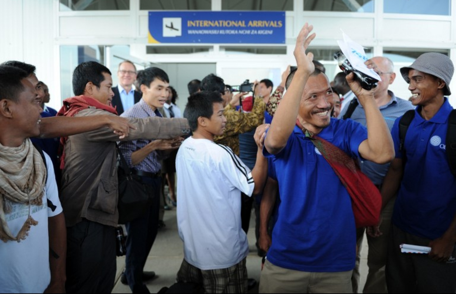 ސޯމާލިއާގެ ކަނޑުފޭރޭ މީހުން ދޫކޮށްލި ފަޅުވެރިން ނައިރޯބީ އެއާޕޯޓުގައި. --ފޮޓޯ:އޭއެފްޕީ