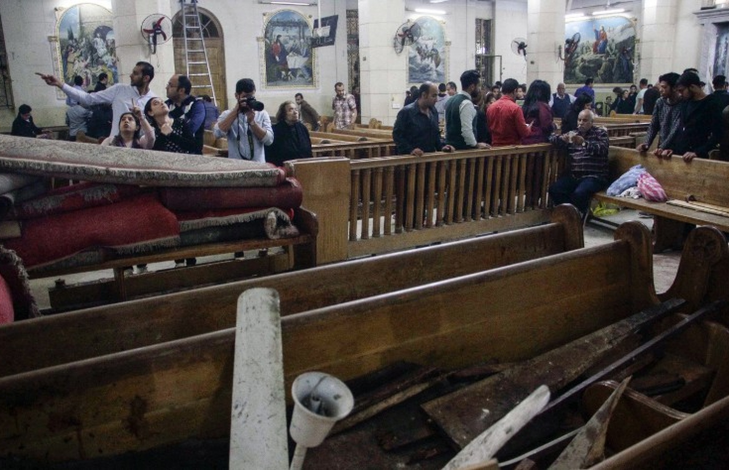 މިސްރުގެ އުތުރުގެ ސިޓީ ތަންތާގެ ކްރިސްޓިއަން ފައްޅިއަކަށް ދިން ބޮމުގެ ހަމަލާގައި ލިބިފައިވާ ގެއްލުންތައް. --ފޮޓޯ:އޭއެފްޕީ