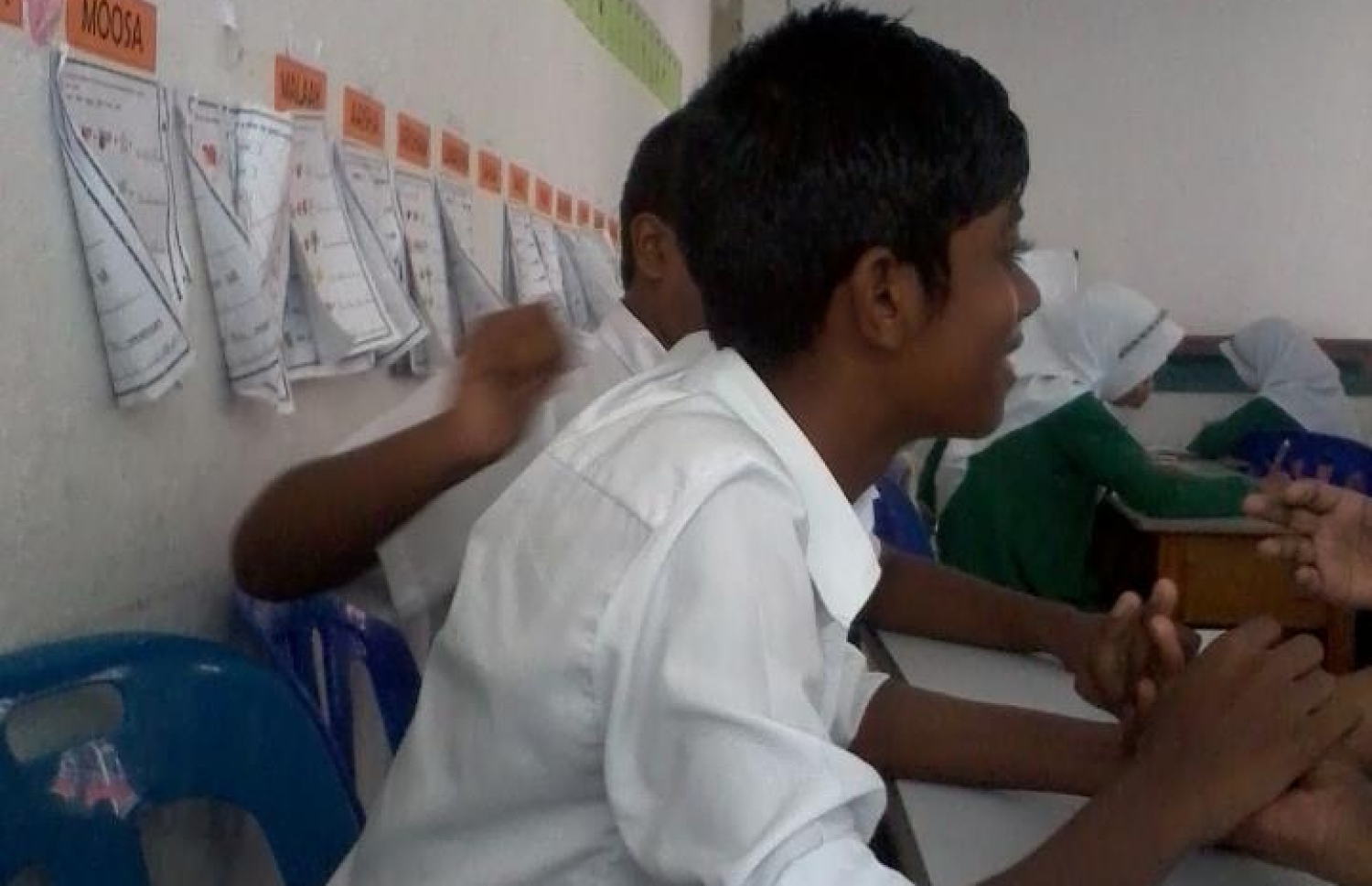 ޝަލަބީ އަރަބިއްޔާ ސްކޫލްގެ ކްލާހެއްގައި: އޭނާ ކިޔެވުން ފުރިހަމަ ކުރީ އެ ސްކޫލުން