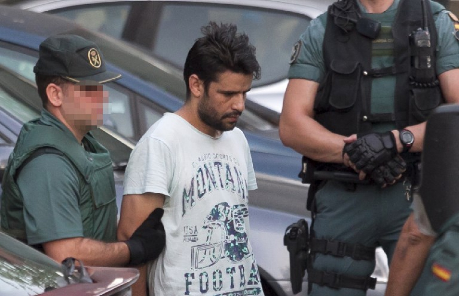 ސްޕޭނުގައި ހަމަލާ ދޭން އުޅުނު ކަމަށް ތުހުމަތު ކުރެވޭ މީހަކު ކޯޓަށް ހާޒިރު ކުރަނީ. --ފޮޓޯ:އޭއެފްޕީ