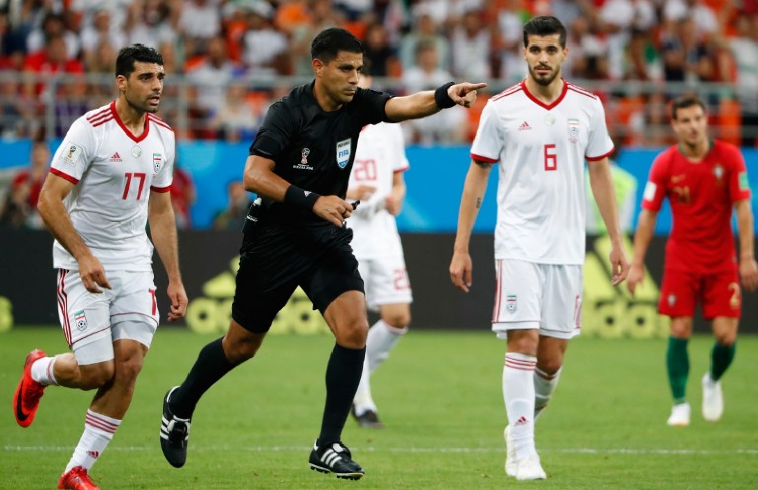 ސަރާންސް، ރަޝިއާ: ޖޫން 25، 2018: ވޯލްޑް ކަޕް ފުޓްބޯޅަ މުބާރާތުގައި ޕޯޗުގަލް އާ އީރާން ކުޅުނު މެޗުގެ ތެރެއިން: މި މެޗުން 1-1 އިން ވަނީ ދެ ޓީމު އެއްވަރުވެފައި. --ފޮޓޯ: އޭއެފްޕީ