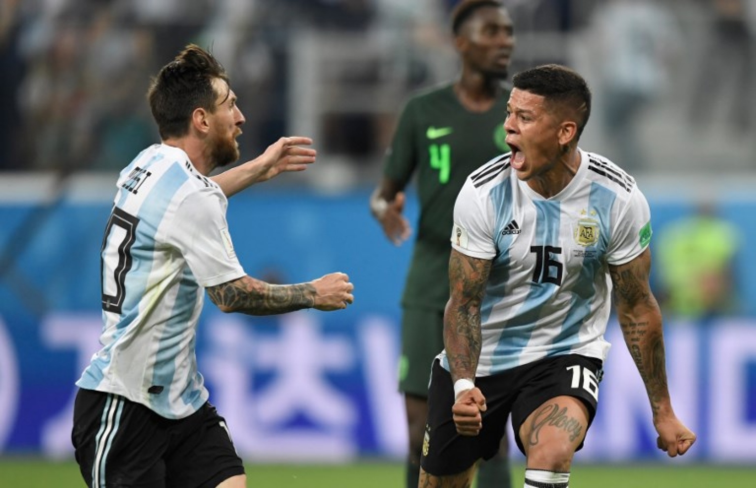 ސެއިން ޕީޓާސްބާގް، ރަޝިއާ: ޖޫން 26، 2018: ވޯލްޑް ކަޕް ފުޓްބޯޅަ މުބާރާތުގައި އާޖެންޓީނާ އާ ނައިޖީރިއާ ކުޅުނު މެޗުގެ ތެރެއިން: މެޗު ނިމެން ހަތަރު މިނިޓަށް ވެފައި ވަނިކޮށް މާކޯސް ރޯހޯ ޖެހި ގޯލުން 2-1 އިން ނައިޖީރިއާ ބަލިކޮށް ވޯލްޑް ކަޕް ފުޓްބޯޅަ މުބާރާތުގެ ދެ ވަނަ ބުރުގެ ޖާގައެއް އާޖެންޓީނާ އިން ވަނީ ހޯދައިފައި. --ފޮޓޯ: އޭއެފްޕީ