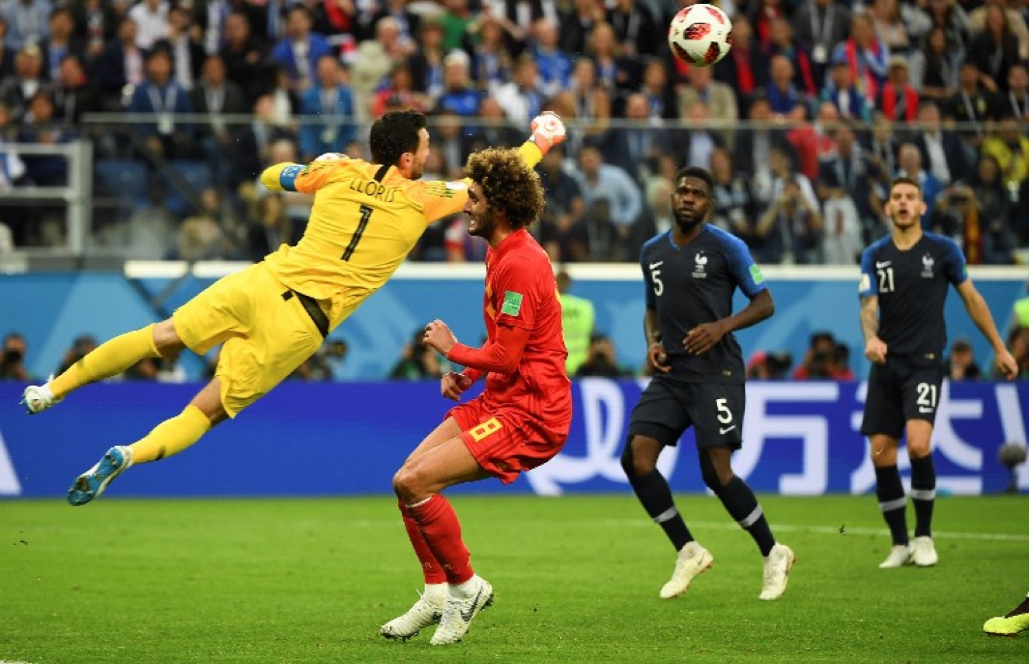 ސެއިން ޕީޓާސްބާގް: ޖުލައި 10، 2018: ވޯލްޑް ކަޕް ފުޓްބޯޅަ މުބާރާތުގައި ފްރާންސް އާ ބެލްޖިއަމް ކުޅުނު މެޗުގެ ތެރެއިން: ސެމީ ފައިނަލް ފުރަތަމަ މެޗުން ބެލްޖިއަމްގެ މައްޗަށް 1-0 އިން ކުރިހޯދައި ފްރާންސް 12 އަހަރަށް ފަހު މުބާރާތުގެ ފައިނަލުން ވަނީ ޖާގަ ހޯދައިފައި.-- ފޮޓޯ: އޭއެފްޕީ