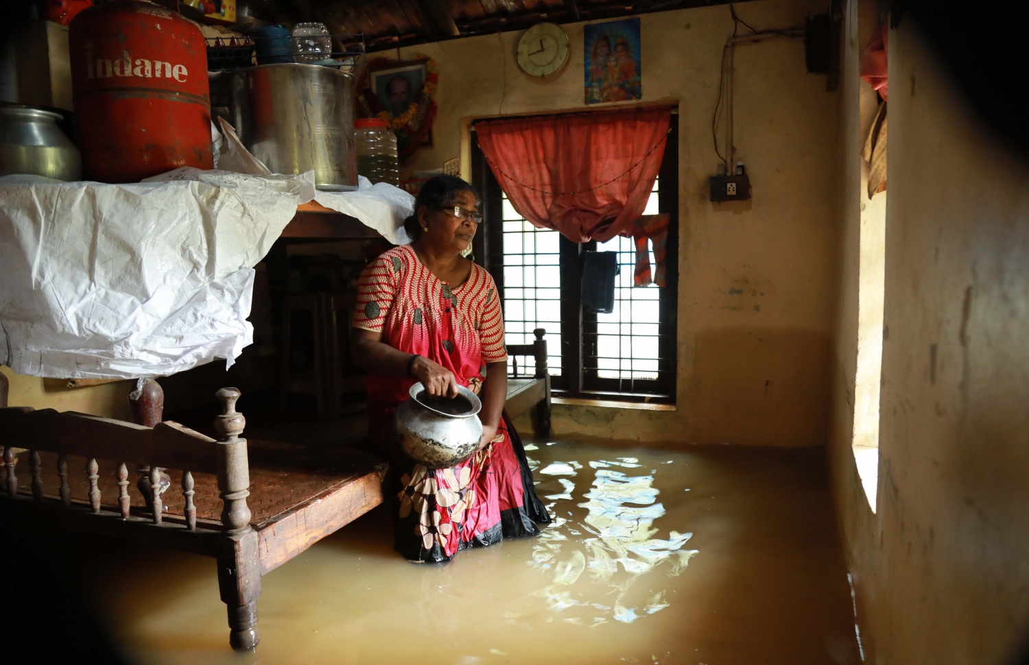 ކެރަލާ ސްޓޭޓުގެ ކޮޗިންގެ ގެއެއްގައި ފެންބޮޑުވެފައި. --ފޮޓޯ:އޭއެފްޕީ