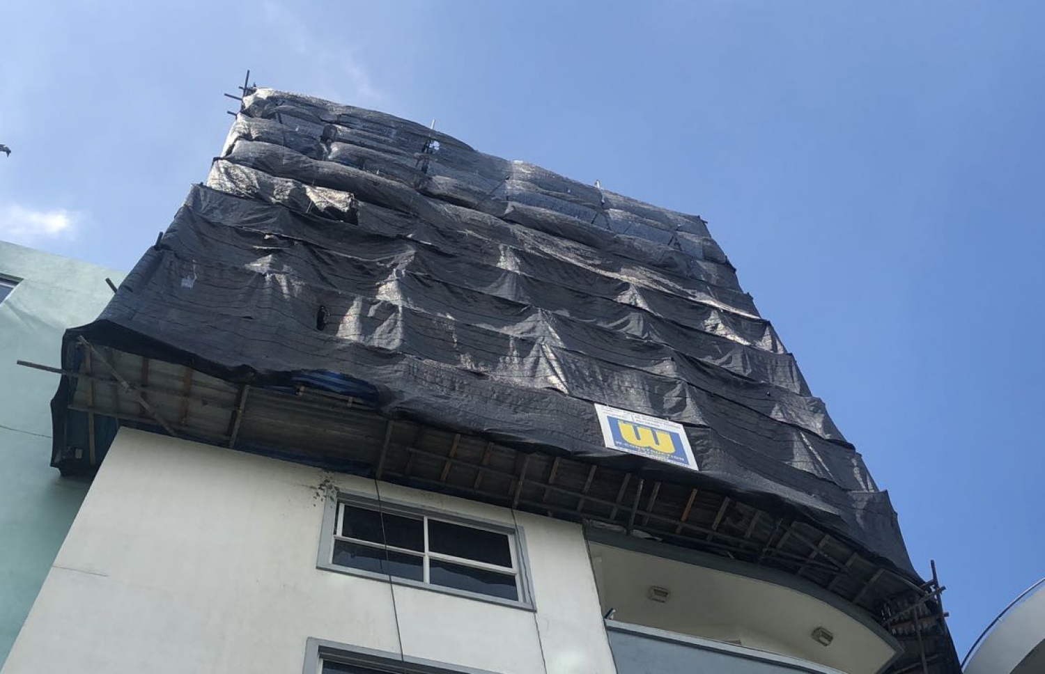 ސިމެންތި ބަސްތާ ވެއްޓުނު އިމާރާތް.--ފޮޓޯ: ނިޝާން އަލީ/ މިހާރު