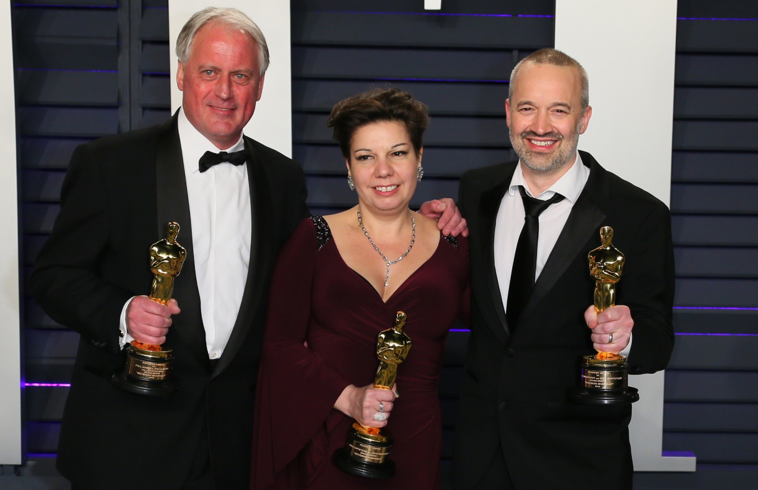 ފެބްރުއަރީ 25، 2019: އޮސްކާ އެވޯޑްސްގެ އެންމެ މޮޅު ސައުންޑް މިކްސް "ބޮހީމިއަމް ރަފްސޮޑީ" ޕޯލް މަސޭ (ވ) އަދި އެންމެ މޮޅު ސައުންޑް އެޑިޓިން ޖޯން ވާހާޓްސް (ކ) އަދި ނީނާ ހާޓްސްޓޯން އެވޯޑާ އެކު. --ފޮޓޯ:އޭއެފްޕީ