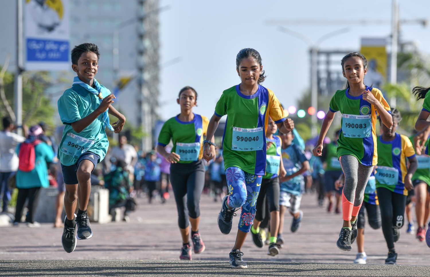 މާލެ- 9  މާޗް 2019 : ފުރަތަމަ ފަހަރަށް ބޭއްވި މޯލްޑިވްސް އިންޓަނޭޝަނަލް މެރެތަން ނިންމާލުމަށް ބޭއްވި ކިޑްސް މައިލްސްގައި ކުޑަކުދިން އިއްޔެ ހަވީރު ދުވަނީ --. ފޮޓޯ: ނިޝާން އަލީ/ މިހާރު