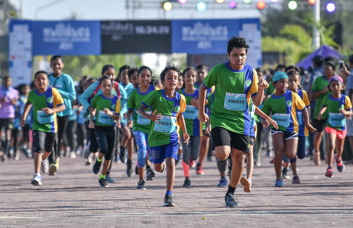 މާލެ- 9  މާޗް 2019 : ފުރަތަމަ ފަހަރަށް ބޭއްވި މޯލްޑިވްސް އިންޓަނޭޝަނަލް މެރެތަން، 800 އެއްހާ ކުދިން ބައިވެރިވި ހާއްސަ އިވެންޓަކާ އެކު އިއްޔެ ހަވީރު ކާމިޔާބުކަމާ އެކު ނިންމާލުން: މި މެރެތަންގައި ފުލް މެރެތަން، ހާފް މެރެތަން، 10 ކިލޯމީޓަރު ދުވުން އަދި ފަސް ކިލޯމީޓަރު ދުވުން ވަނީ ބާއްވާފައި--. ފޮޓޯ: ނިޝާން އަލީ/ މިހާރު