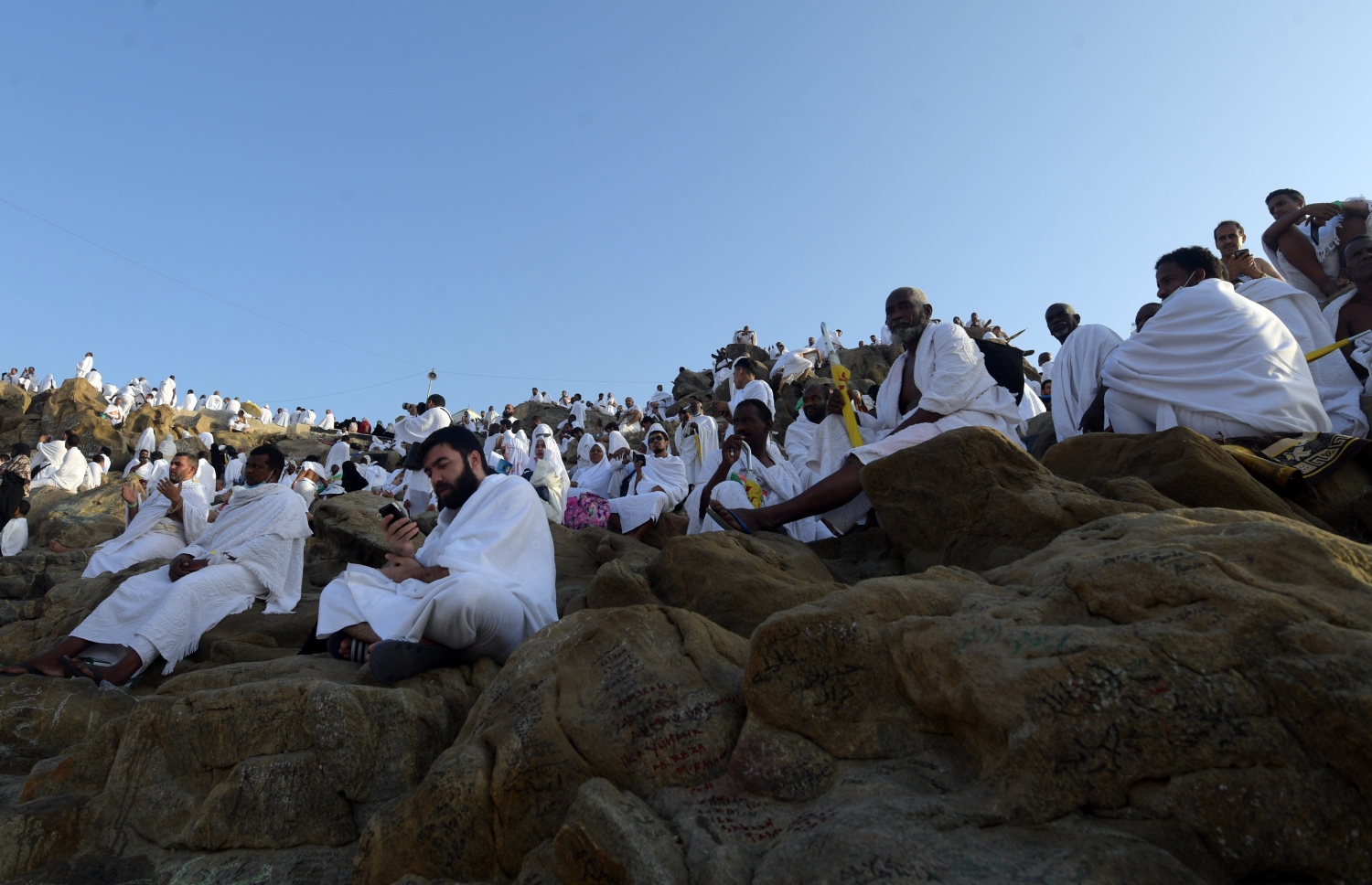 އަރަފާތު: އޮގަސްޓް 10، 2019: ހައްޖުވެރިން އަރަފާތު ބިމުގައި ދުއާ ކުރުމުގައި. --ފޮޓޯ:އޭއެފްޕީ