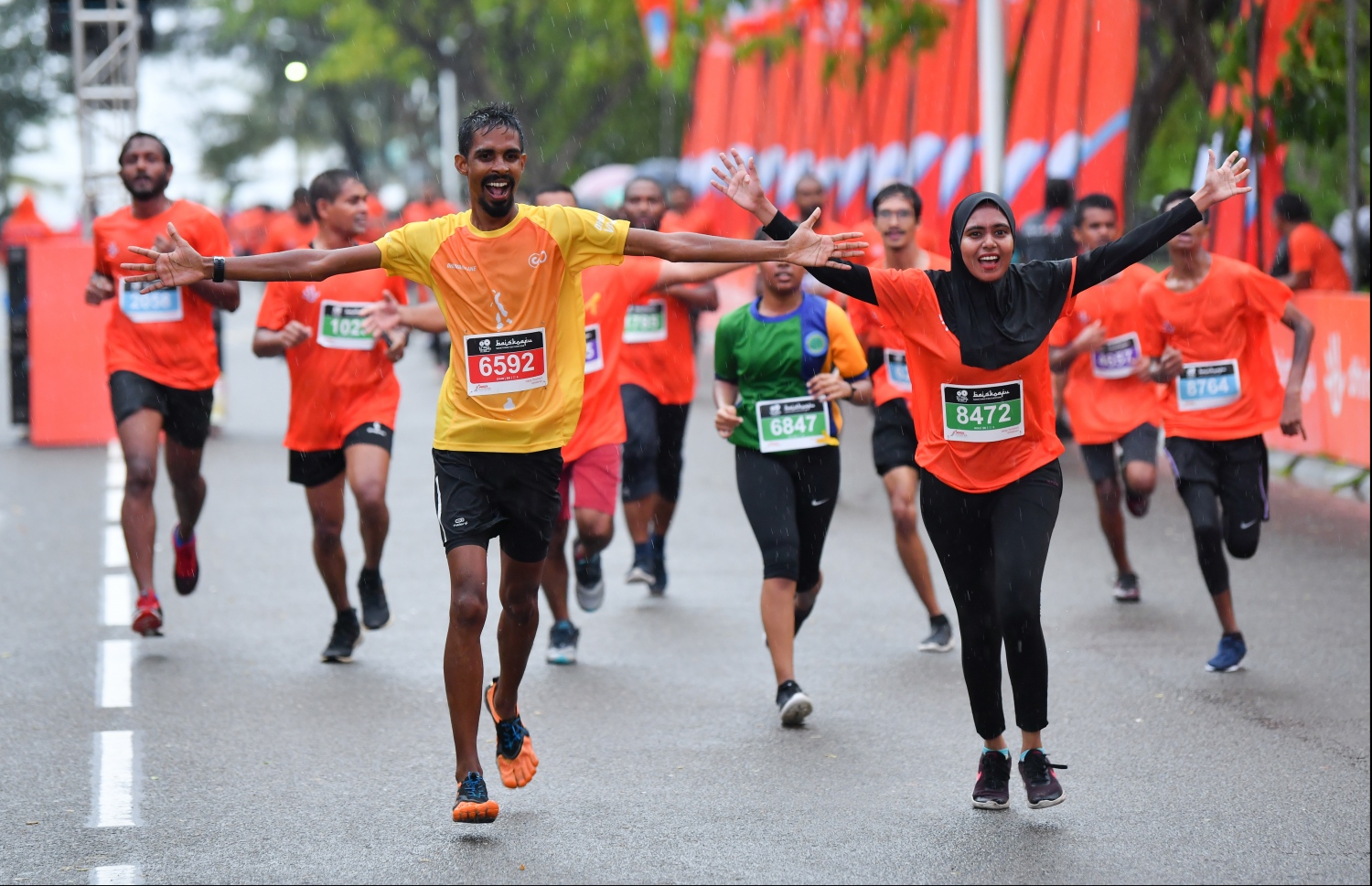 ހުޅުމާލެ: ސެޕްޓެމްބަރު 20، 2019: ރާއްޖޭގައި ބާއްވާ ދުވުމުގެ އެންމެ ބޮޑު ރޭސް ކަމަށްވާ، ދިރާގު މޯލްޑިވްސް ރޯޑް ރޭސްގެ މިއަހަރުގެ 5 ކިލޯމީޓަރު ދުވުމުގެ ތެރެއިން.---ފޮޓޯ: ހުސައިން ވަހީދު/މިހާރު