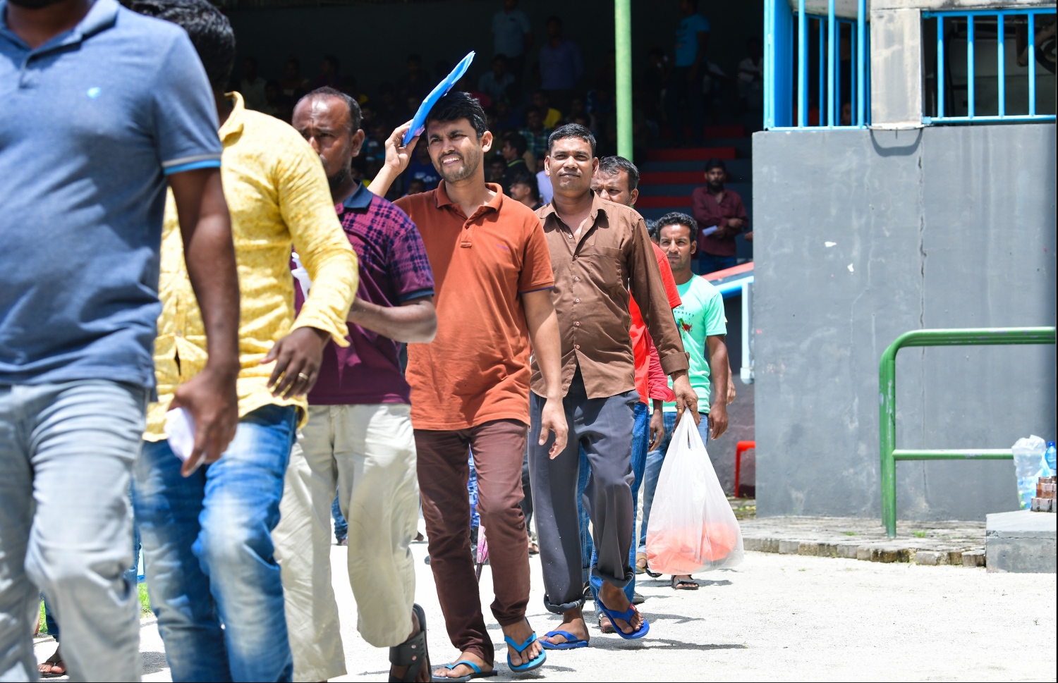 ބިދޭސީން ރަޖިސްޓްރީ ވާން އިކޮނޮމިކް މިނިސްޓްރީން ކުރިއަށް ގެންދިޔަ މަސައްކަތުގައި ބައިވެރިވި ބައެއް ބިދޭސީން: -- ފައިލް ފޮޓޯ: މިހާރު