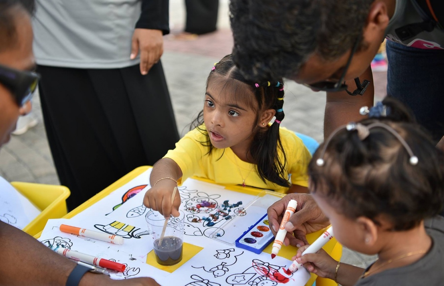 ދުނިޔޭގެ މިދިޔަ އަހަރުގެ ޑައުން ސިންޑްރޯމް ދުވަސް ފާހަގަކުރަން ބިއުޓިފުލް އައިޒް ޖަމިއްޔާ އިން ބޭއްވި ހަރަކާތްތަކުގެ ތެރެއިން.---ފޮޓޯ: ބިއުޓިފުކް އައިޒް