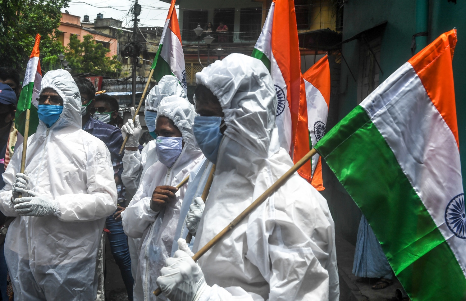 ނިއު ދިއްލީ - އޮގަސްޓް 15، 2020: ކޮރޯނާވައިރަހާ ދެކޮޅަށް މަސައްކަތް ކުރާ އިންޑިއާގެ ފްރަންޓްލައިން މަސައްކަތު މީހުން އެ ގައުމުގެ 74 ވަނަ މިނިވަން ދުވަސް ފާހަގަކުރަނީ. --ފޮޓޯ:އޭއެފްޕީ