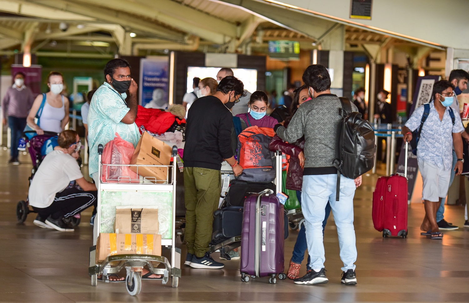 އިންޑިއާ އިން އައި ޓޫރިސްޓުންތަކެއް އެއާޕޯޓުގައި -- ފައިލް ފޮޓޯ: މިހާރު