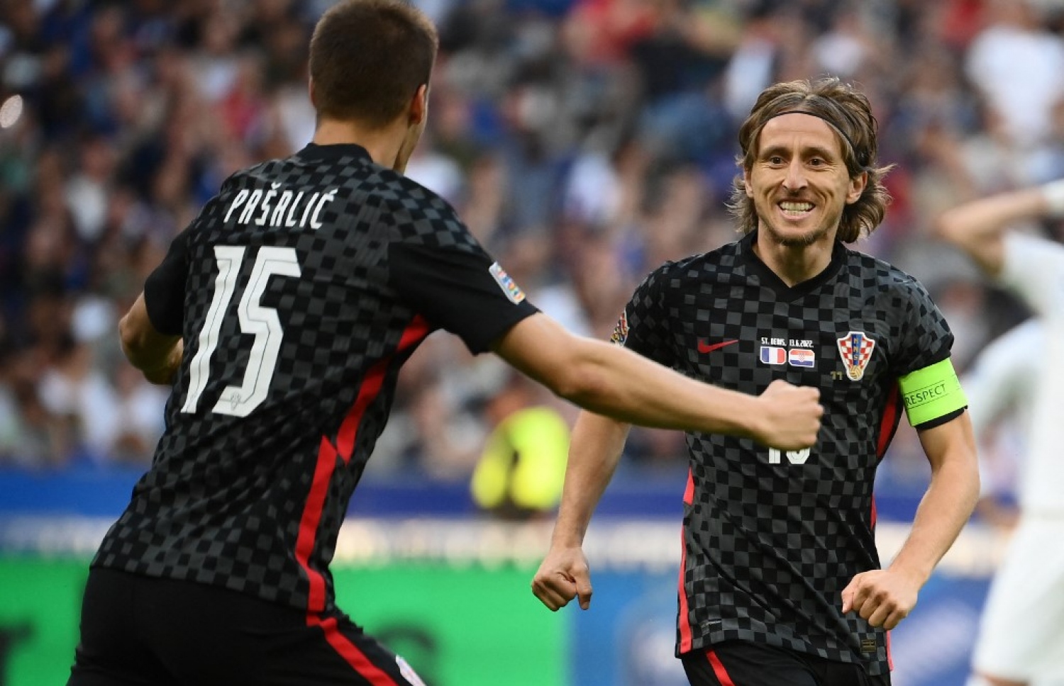 ކްރޮއޭޝިއާ އަށް ލީޑު ނަގައިދިނުމަށް ފަހު މޮޑްރިޗް (ކ) އުފާފާޅުކުރަނީ.-- ފޮޓޯ: އޭއެފްޕީ