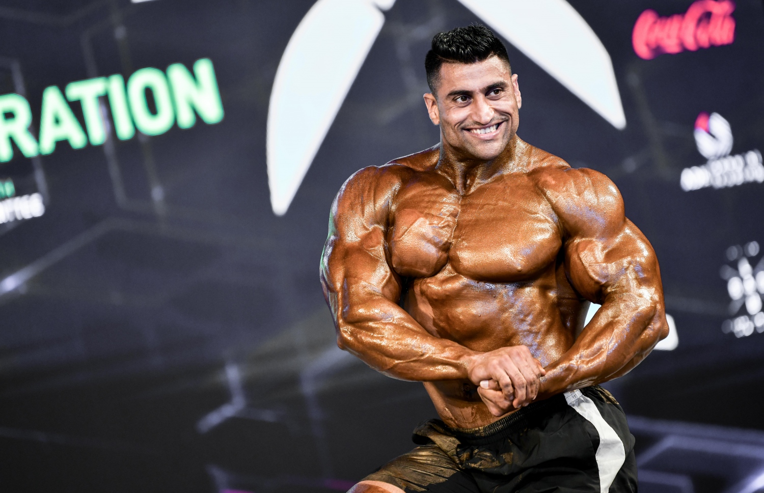 ރާއްޖޭގައި ބާއްވާ އޭޝިއާގެ ބޮޑީ ބިލްޑިން އަދި ފިޒިކް ސްޕޯޓްސް ޗެމްޕިއަންޝިޕް އިފްތިތާހު ކުރުމަށް ކ. މާފުށީގައި ބޭއްވި ހަފުލާގައި މުބާރާތުގެ ބައިވެރިއަކު ފިޒިކް ދައްކާލަނީ.--- ފޮޓޯ: ނިޝާން އަލީ/މިހާރު