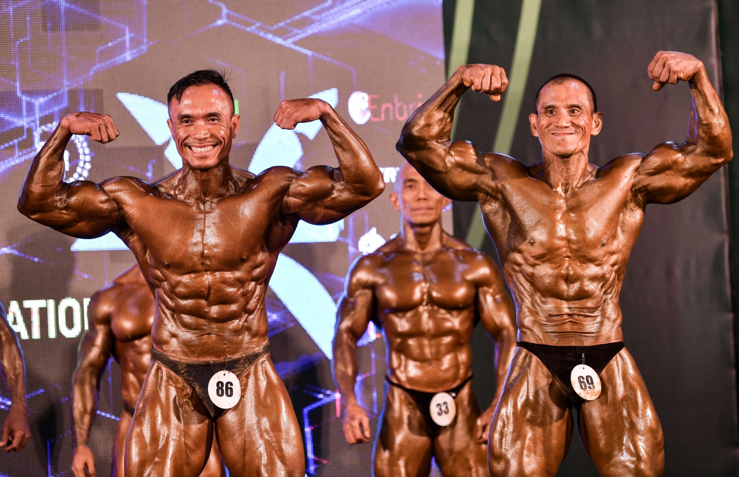 ރާއްޖޭގައި މިއަދު ފެށި އޭޝިއާގެ ބޮޑީ ބިލްޑިން ޗެމްޕިއަންޝިޕްގެ އިވެންޓެއްގައި އެކި ގައުމުގެ އެތުލީޓުން ވާދަކުރަނީ.--- ފޮޓޯ: ނިޝާން އަލީ/މިހާރު