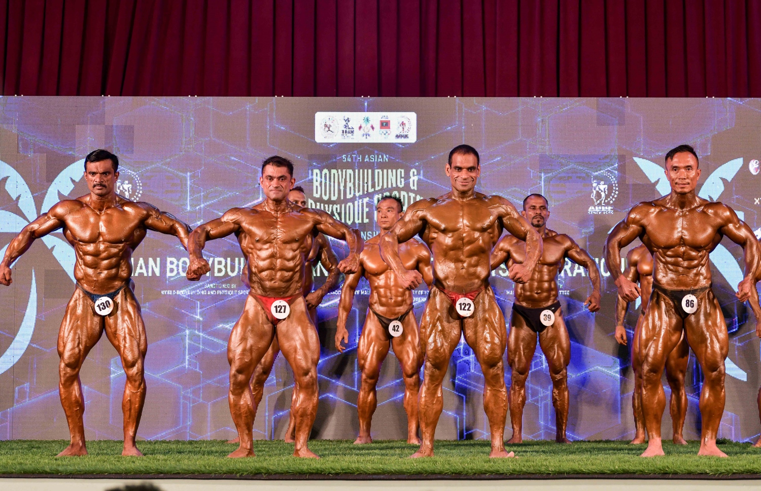 ރާއްޖޭގައި މިއަދު ފެށި އޭޝިއާގެ ބޮޑީ ބިލްޑިން ޗެމްޕިއަންޝިޕްގެ އިވެންޓެއްގައި އެކި ގައުމުގެ އެތުލީޓުން ވާދަކުރަނީ.--- ފޮޓޯ: ނިޝާން އަލީ/މިހާރު