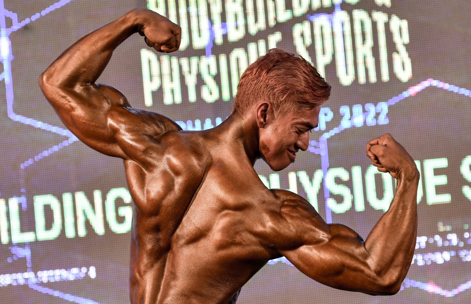 އޭޝިއަން ބޮޑީ ބިލްޑިން ޗެމްޕިއަންޝިޕްގެ މިއަދުގެ އިވެންޓުގައި އެތުލީޓަކު ވާދަކުރަނީ.--- ފޮޓޯ: ނިޝާން އަލީ/މިހާރު