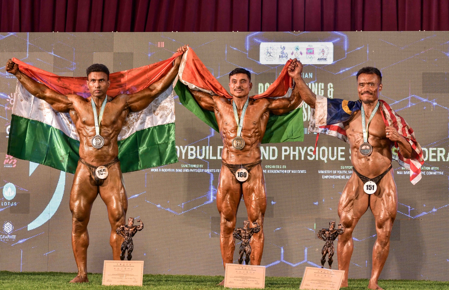 އޭޝިއަން ބޮޑީ ބިލްޑިން ޗެމްޕިއަންޝިޕްގެ މިއަދުގެ އިވެންޓުގައި އެތުލީޓުން ވާދަކުރަނީ.--- ފޮޓޯ: ނިޝާން އަލީ/މިހާރު