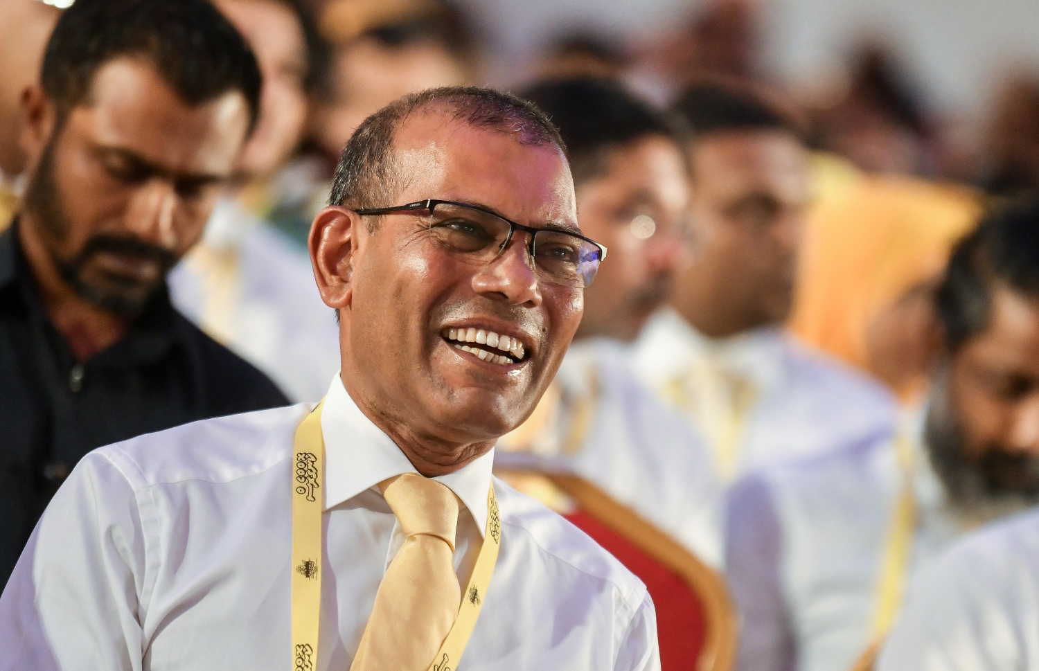 ރައްޔިތުންގެ މަޖިލީހުގެ ރައީސް އަދި އެމްޑީޕީގެ ރައީސް މުހައްމަދު ނަޝީދު، އެމްޑީޕީގެ ކޮންގްރެސް ފެށުމުގެ ޖަލްސާގައި ބައިވެރިވެ ވަޑައިގަންނަވަނީ.--- ފޮޓޯ: ފަޔާޒު މޫސާ | މިހާރު