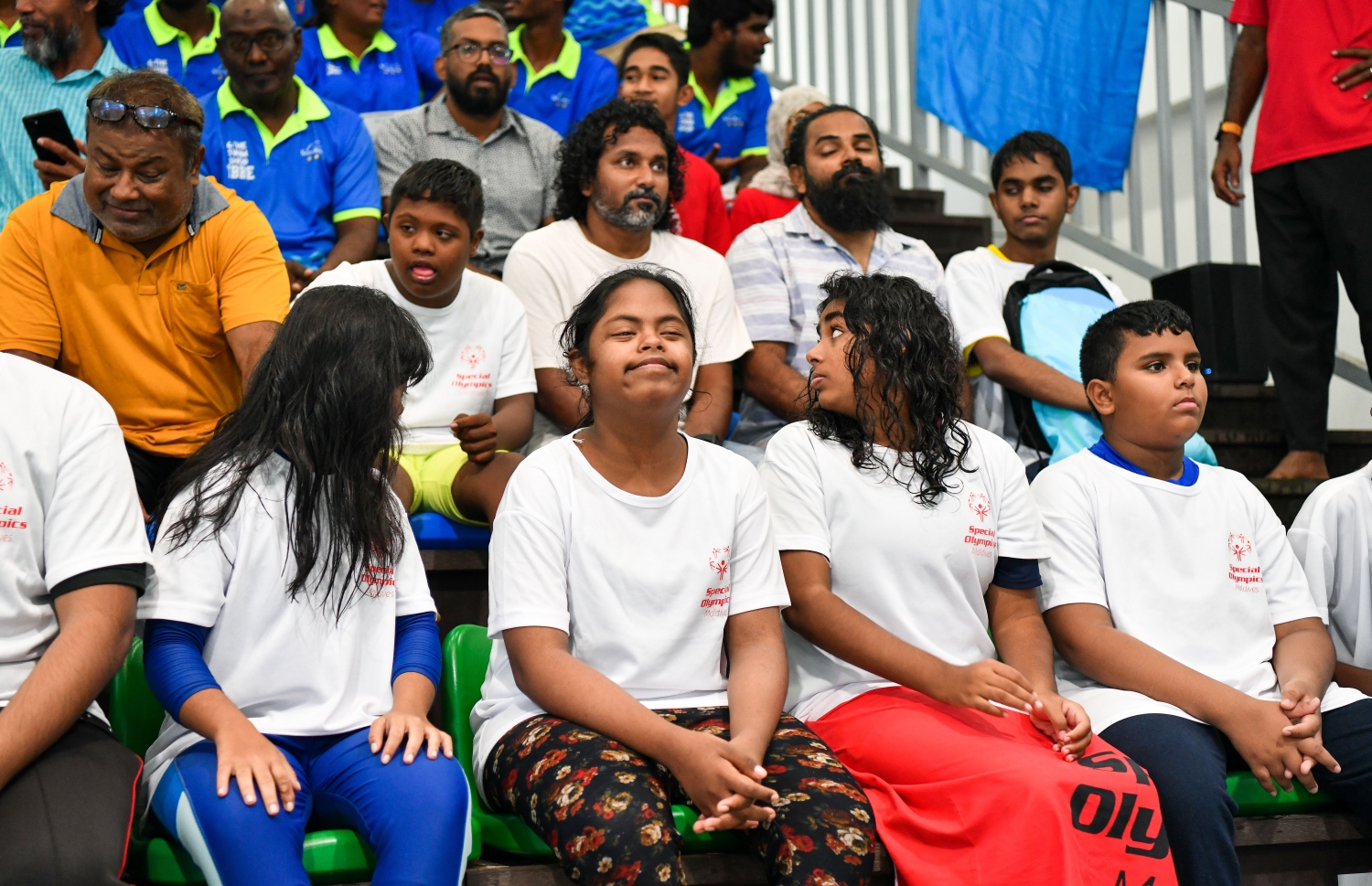 ނުކުޅެދުންތެރިކަން ހުންނަ ކުދިންނަށް ހާއްސަ ކޮށްގެން ނިއު ލެގޫން ސްވިމިން ކްލަބުން ބޭއްވި ސްޕެޝަލް އޮލިމްޕިކް ފެސްޓިވަލް ނިންމުމުގެ ރަސްމިއްޔާތުގައި އެ ހަރަކާތުގައި ބައިވެރިވި ބައެއް ކުދިން.--- ފޮޓޯ: ފަޔާޒު މޫސާ | މިހާރު