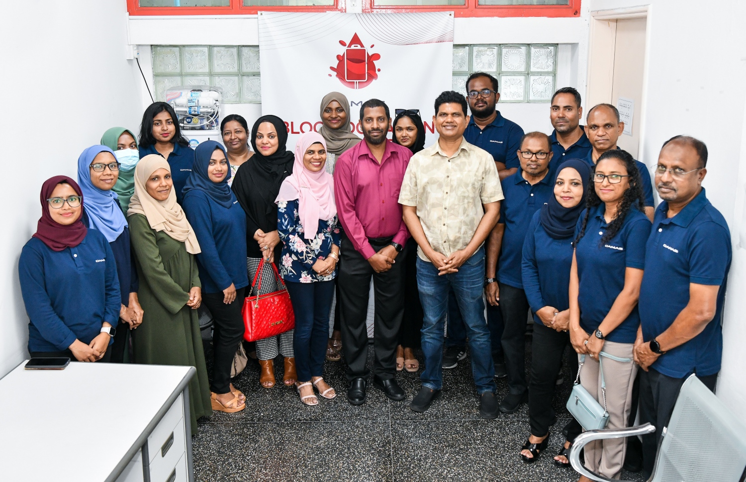 ދަމާސް އިން ލޭ ހަދިޔާ ކުރުމަށް ހިންގި ހަރަކާތުގެ ބައިވެރިން -- ފޮޓޯ: ފަޔާޒް މޫސާ/ މިހާރު