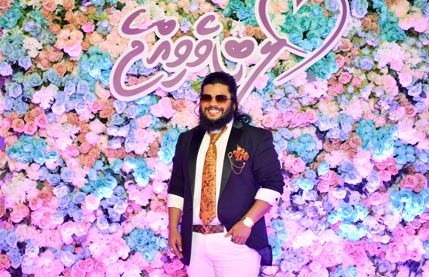 ފިލްމް "ލޯބިވެވިއްޖެ" ޕްރިމިއާ ހަފްލާގައި ދިވެހި ފިލްމް އިންޑަސްޓްރީގެ ތަރި ފުބޫ ފޮޓޯއަކަށް ހުއްޓިގެން.-- ފޮޓޯ: ނިޝާން އަލީ /މިހާރު