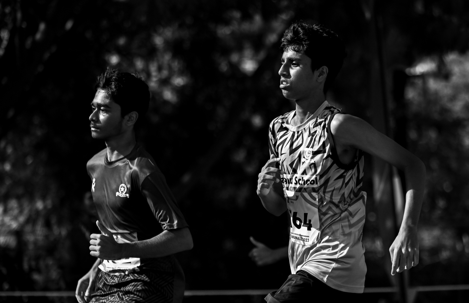 ކަލާފާނު ސްކޫލާއި އަމީނިއްޔާ ސްކޫލްގެ އެތްލީޓުން 17 އަހަރުން ދަށުގެ 200 މީޓަރު ދުވުމުގައި ދުވަނީ.--- ފޮޓޯ: ފަޔާޒު މޫސާ | މިހާރު