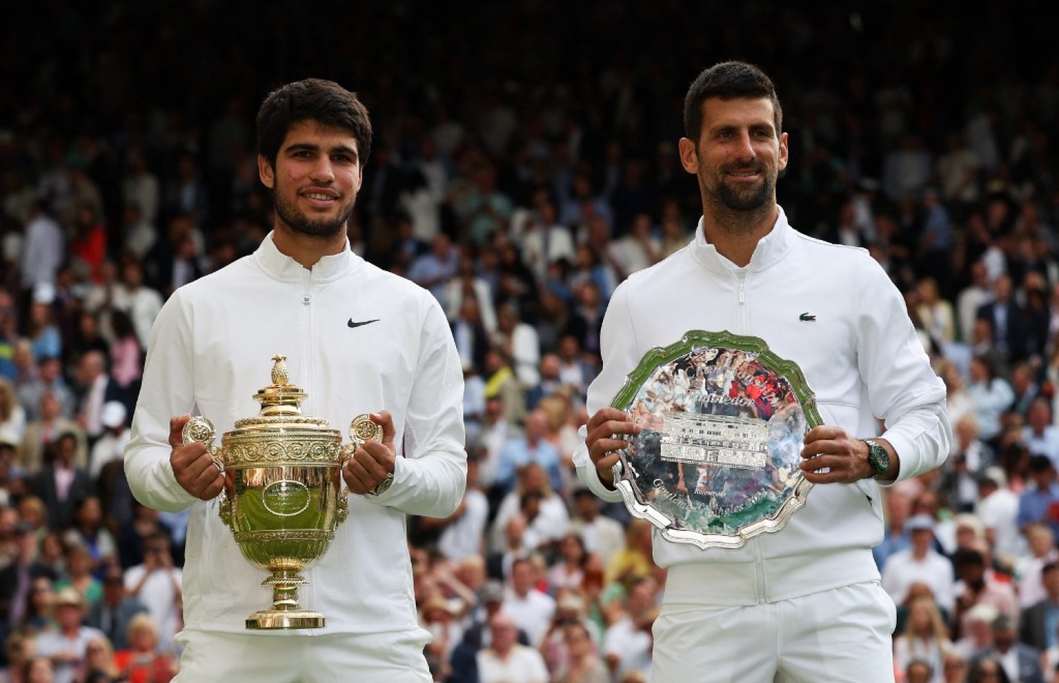 އަލްކަރާޒް އާއި ރަނަރަޕް ޖޮކޮވިޗް (ކ)، މިއީ އަލްކަރާޒް، ގްރޭންޑް ސްލޭމް މުބާރާތެއްގައި ޖޮކޮވިޗް ބަލިކުރި ފުރަތަމަ ފަހަރު.-- ފޮޓޯ: އޭއެފްޕީ