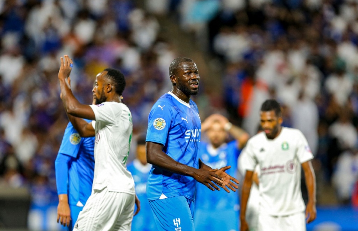 ހިލާލް އާއި އަލް އަހްލީ ޓްރިޕޯލީ އާ ދެކޮޅަށް ކުޅުނު މެޗުގައި ކުލިބާލީ (ކ).-- ފޮޓޯ: އޭއެފްޕީ