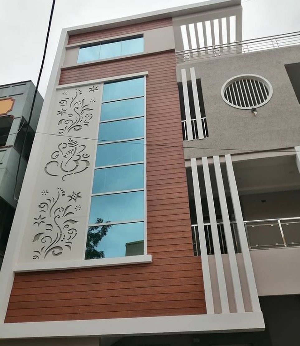 ޝެރާ ބޯޑު ބޭނުން ކޮށްގެން އިމާރާތެއްގެ ބޭރު ޑިޒައިންކޮށްފަ. -- ފޮޓޯ: ސްޓީލް ހާޑްވެއާ