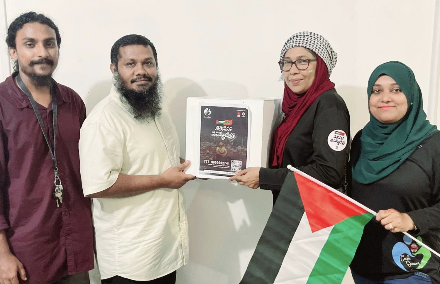 ކޭކް ޑޮނާސް އިން އިއްޔެ ބޭއްވި ހަރަކާތުން ލިބުނު ފައިސާ، އިންޓަނޭޝަނަލް އެއިޑް ކެމްޕެއިނަށް ހަވާލުކުރަނީ.-- ފޮޓޯ: ކޭކް ޑޮނާސް