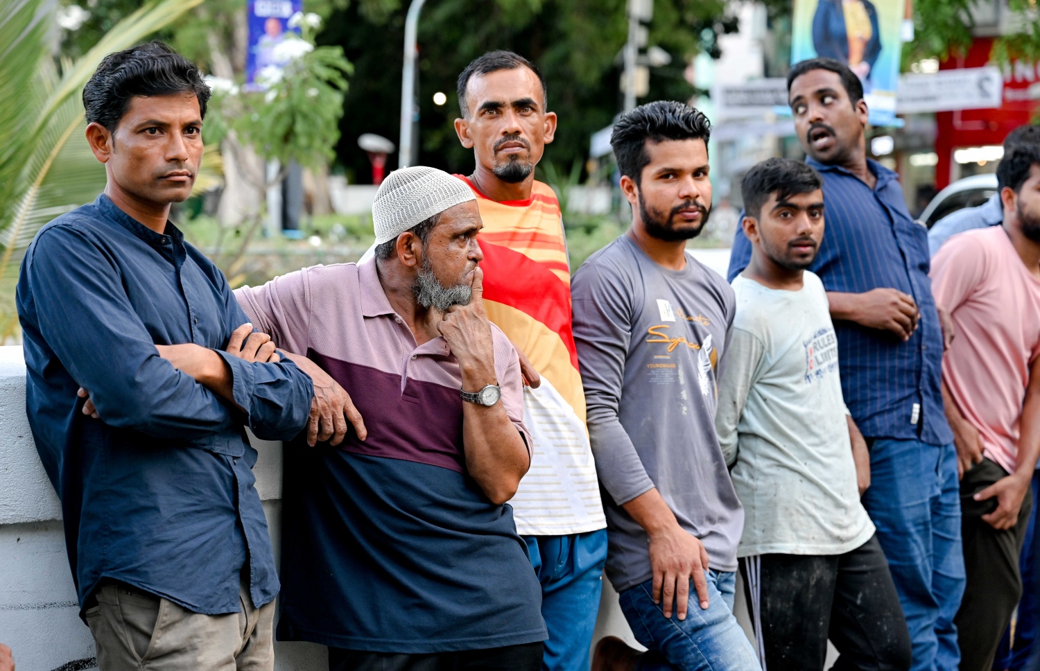 މިޝަން ފޯ މައިގްރެންޓް ވޯކާސް މޯލްޑިވްސްގެ ފަރާތުން ބިދޭސީ މަސައްކަތްތެރިނަށް ރޯދަ ވީއްލުން ބަހާއިރު، ބިދޭސީން ކިއު ހަދައިގެން.-- ފޮޓޯ: ނިޝާން އަލީ/ މިހާރު