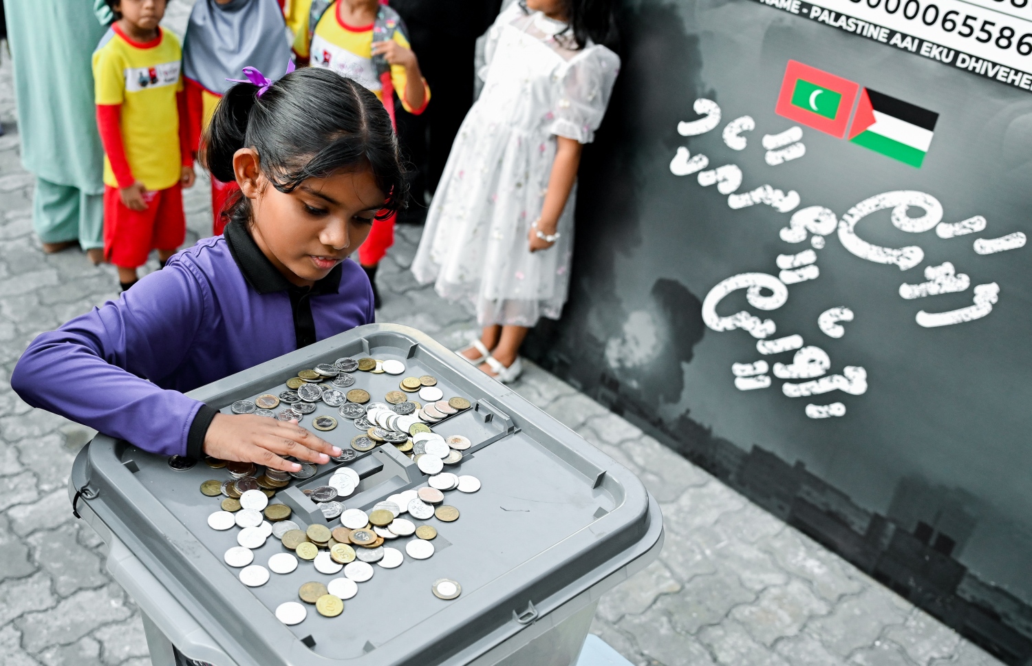 "ފަލަސްތީނާ އެކު ދިވެހީން" ޓެލެތޯން
