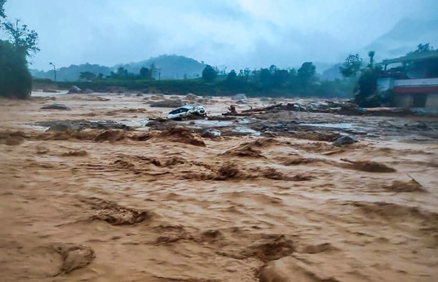 އިންޑިއާގެ ކެރެލާގެ ވަޔަނަދު ޑިސްޓްރިކްޓުގައި ފެން ބޮޑުވެފައި. -- ފޮޓޯ: އޭއެފްޕީ