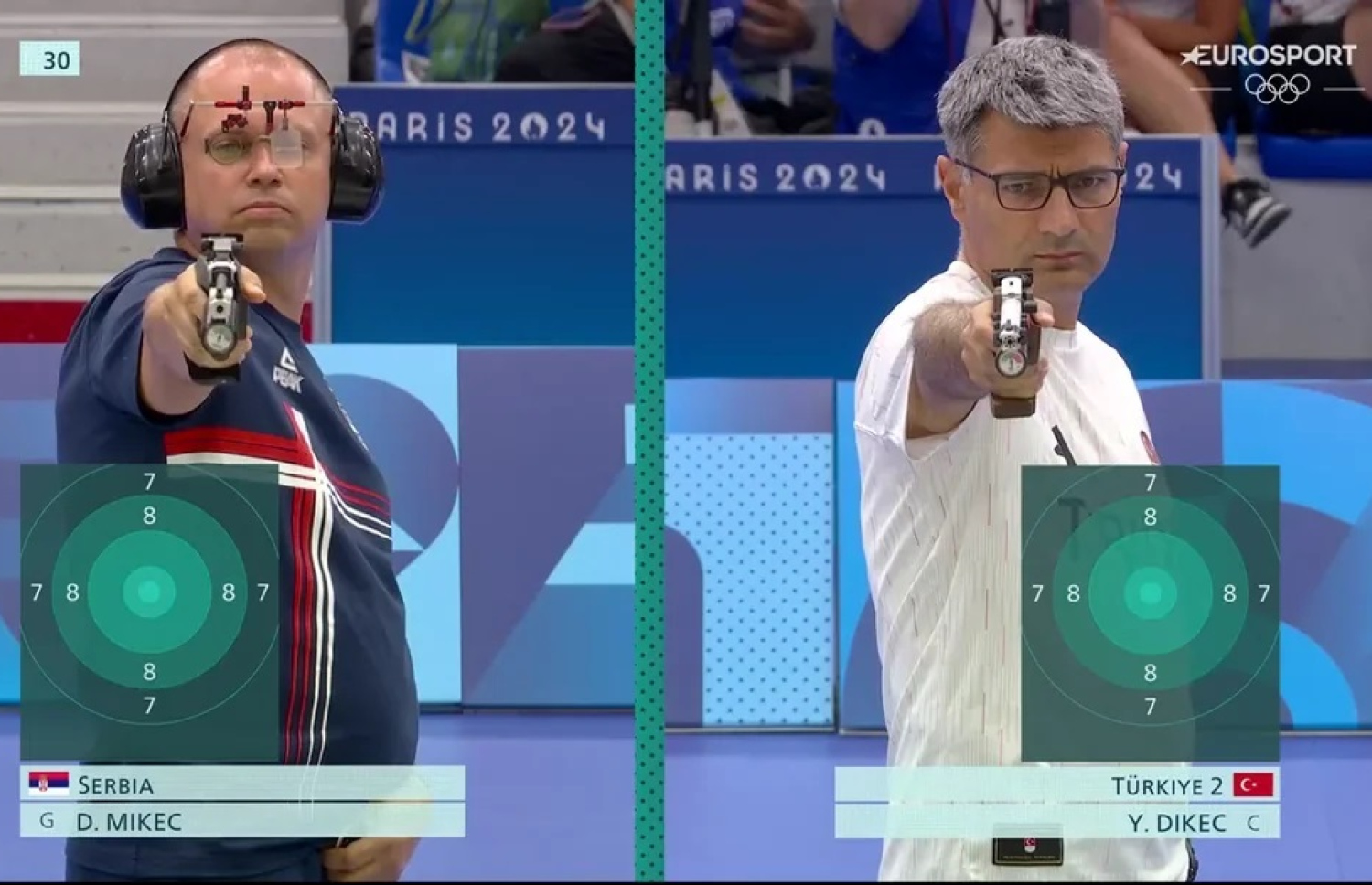 ތުރުކީގެ ޝޫޓަރު ޑިކެކް (ކ) މިއަހަރުގެ އޮލިމްޕިކްސްގައި ރިހި މެޑަލް ހޯދި އިވެންޓުގެ ފައިނަލްގައި، އިދިކޮޅުން ވާދަކުރި ސާބިއާގެ ޑަމިރު މިކެކް (ވ) އާއެކު.--