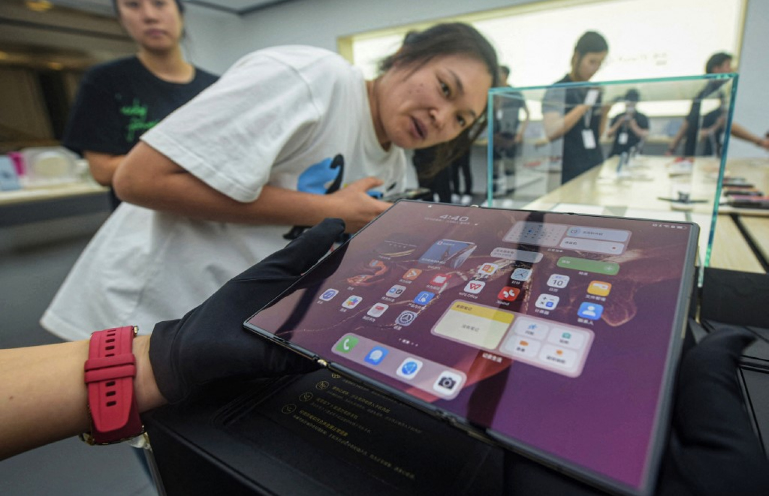 ޗައިނާގެ ވާވޭއިން މިއަދު ތައާރަފްކުރި ފޯނު ދައްކާލަނީ. -- ފޮޓޯ: އޭއެފްޕީ