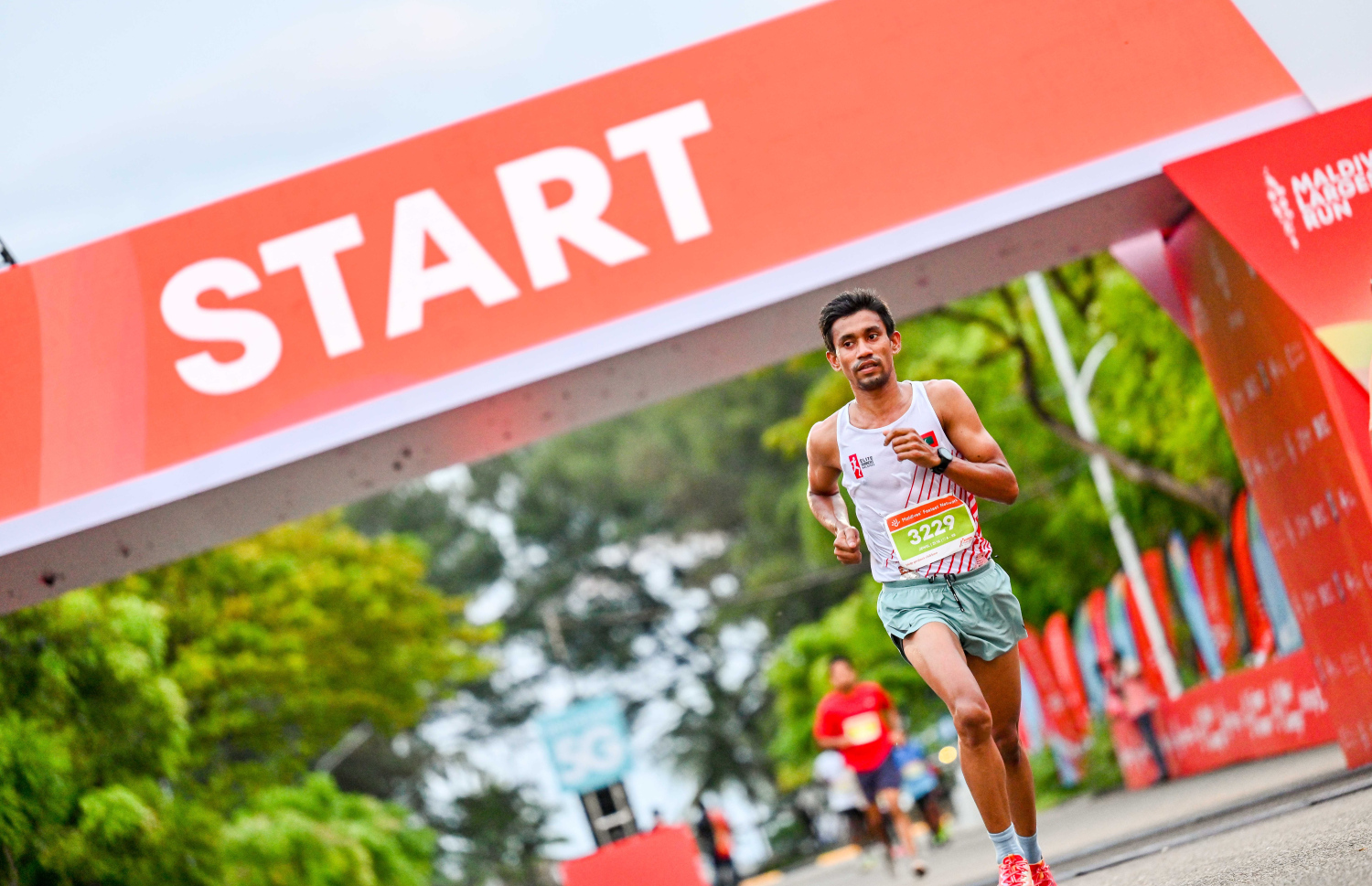 ރާއްޖޭގައި ބާއްވާ ދުވުމުގެ އެންމެ ބޮޑު ރޭސް، ދިރާގު މޯލްޑިވްސް ރޯޑް ރޭހުގެ ހާފް މެރަތަން އިވެންޓްގެ ބައިވެރިއަކު މިއަދު ހެނދުނު ދުވަނީ.--- ފޮޓޯ: ނިޝާން އަލީ | މިހާރު