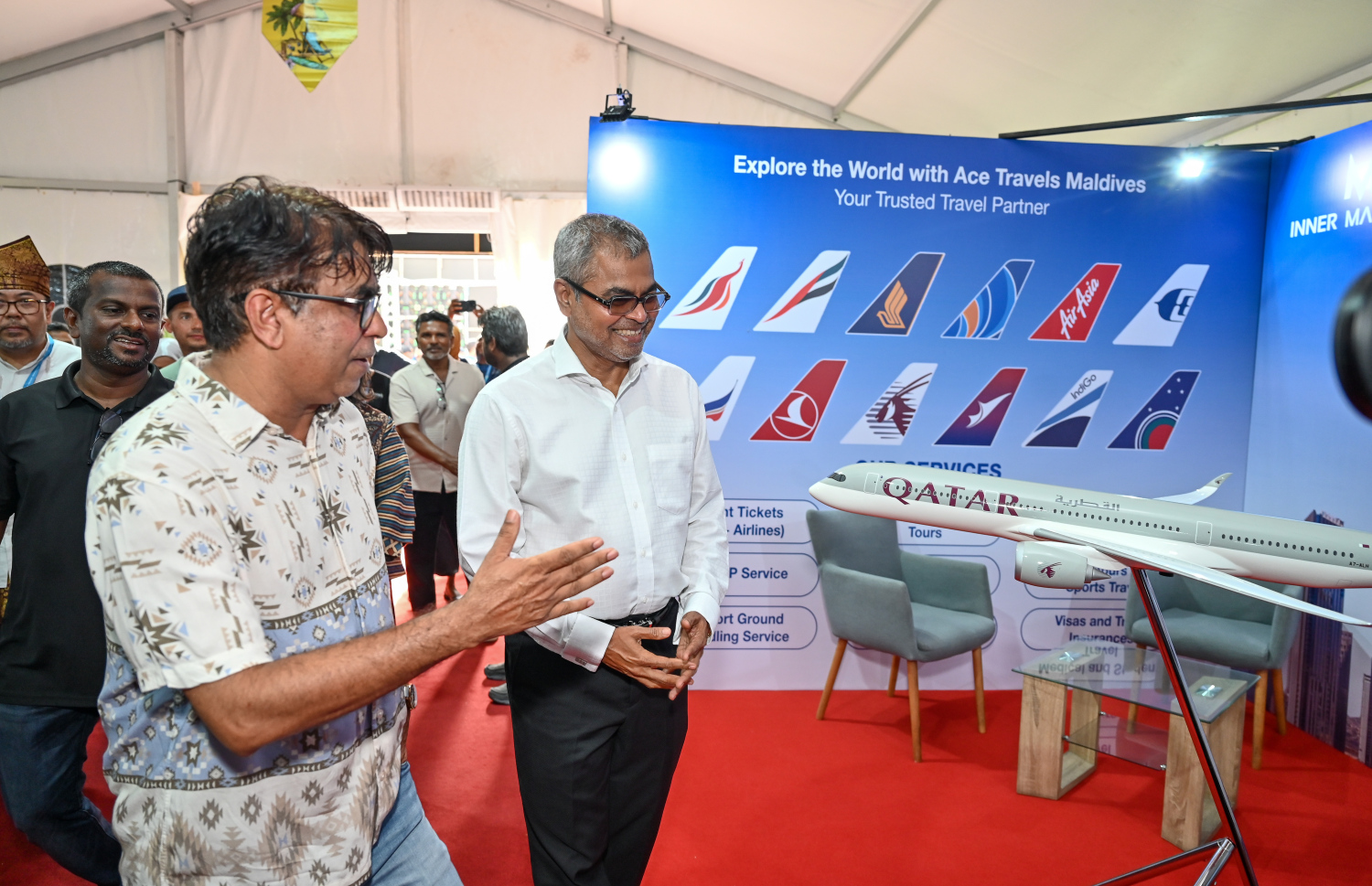 ހައިރައިސް ޕްރައިވެޓް ލިމިޓެޑުން އިންތިޒާމުކޮށްގެން ހުޅުމާލެ ސެންޓްރަލް ޕާކުގައި ކުރިއަށްގެންދާ ވެކޭޝަންސް އެކްސްޕޯ ޓޫރިޒަމް އެންޑް އެންވަޔަރަމަންޓު މިނިސްޓަރު ތޯރިގު އިބްރާހިމް ބައްލަވާލައްވަނީ -- ފޮޓޯ: ނިޝާން އަލީ