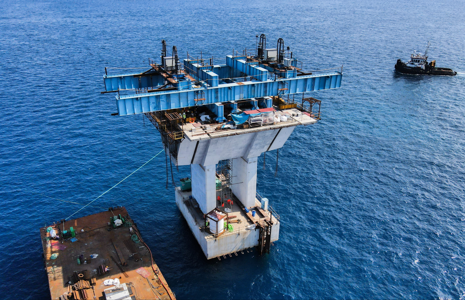 ތިލަމާލެ ބްރިޖުގައި ހަދަނީ ދުނިޔޭގެ އެންމެ އުސް ޕްރީކާސްޓް ސެގްމަންޓް: އިންޑިއާ ހައި ކޮމިޝަނުން ބުނީ ގުޅިފަޅުގައި ހަދަމުން އަންނަ ތިލަމާލެ ބްރިޖުގެ ސުޕަ ސްޓްރަކްޗާގެ ބައިތަކަކީ ދުނިޔޭގައި މިހާތަނަށް ހަދާ (ލޯންގް ލައިން މެތަޑުގެ) އެންމެ އުސް ޕްރީކާސްޓް ސެގްމަންޓްތައް ކަމަށް.--- ފޮޓޯ: ފަޔާޒު މޫސާ | މިހާރު