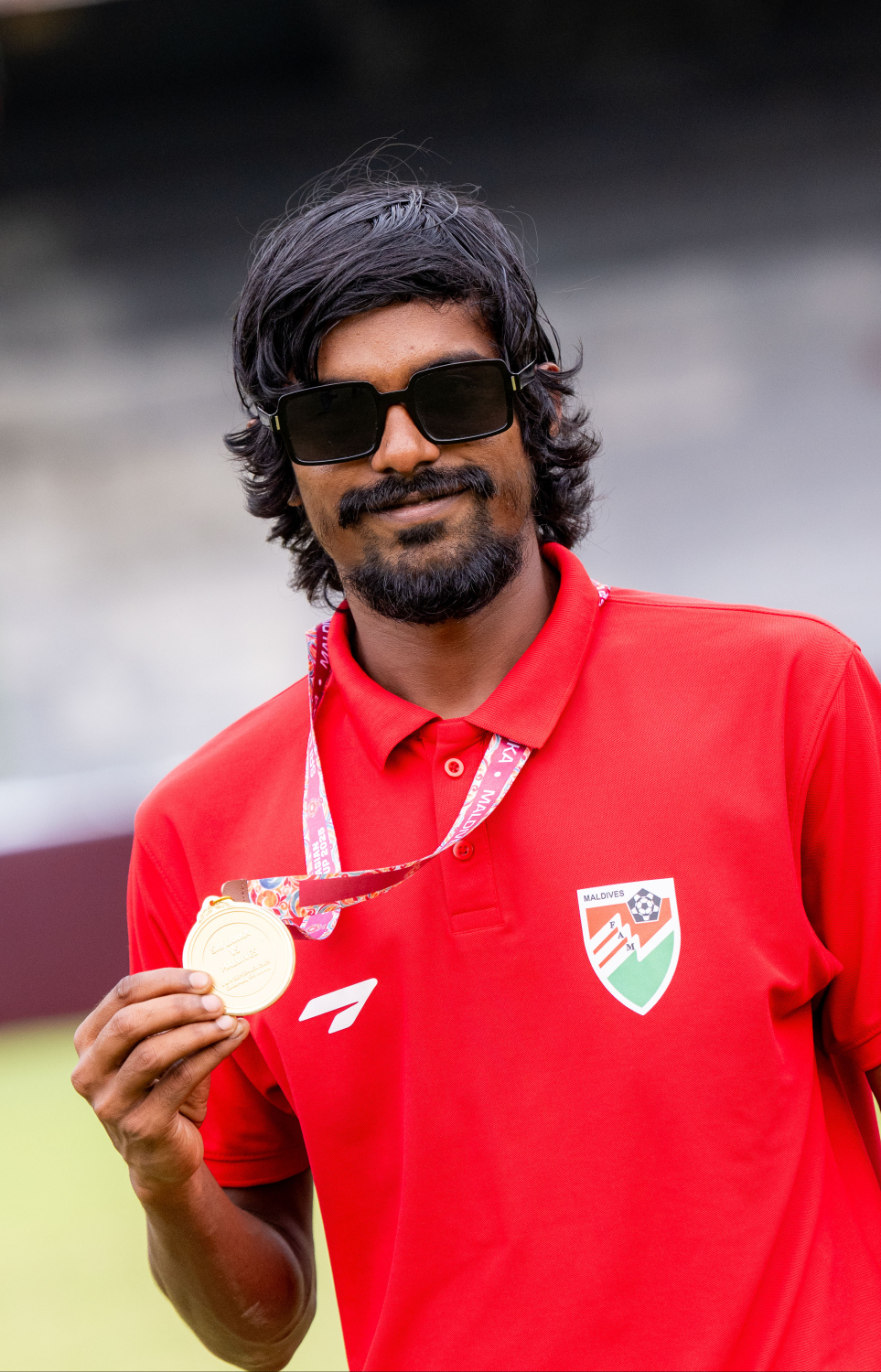 ސްރީ ލަންކާ ފުޓްބޯޅަ ފެޑެރޭޝަނުން އިންތިޒާމުކޮށްގެން އެ ގައުމުގައި ބޭއްވި ސައުތު އޭޝިއަން ސުޕަ ކަޕް ކާމިޔާބުކުރި ރާއްޖޭގެ ގައުމީ ފުޓްބޯޅަ ޓީމަށް މަރުހަބާ ކިޔަން ގަލޮޅު ދަނޑުގައި ބޭއްވި ރަސްމިއްޔާތު.-- ފޮޓޯ: ނިޝާން އަލީ | މިހާރު