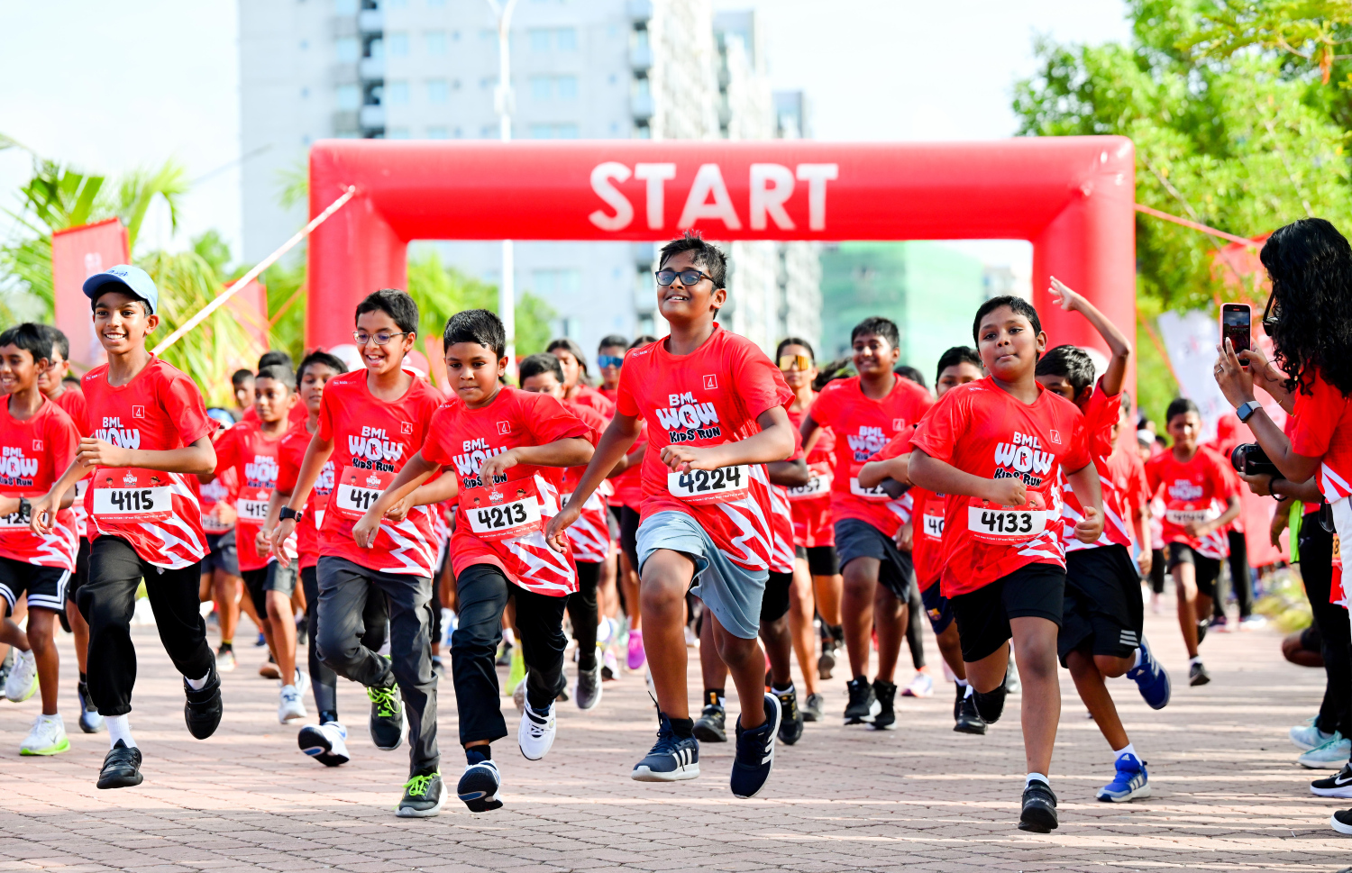 ބީއެމްއެލް އާއި ޓޯޓަލް ފިޓްނަސް ގްރޫޕް (ޓީއެފްޖީ) ގުޅިގެން މިއަދު ހުޅުމާލޭގައި ބޭއްވި ބީއެމްއެލް ވާއު ކިޑްސް ރަންގައި ބައިވެރިވި ދުވުންތެރިން.-- ފޮޓޯ: ނިޝާން އަލީ | މިހާރު