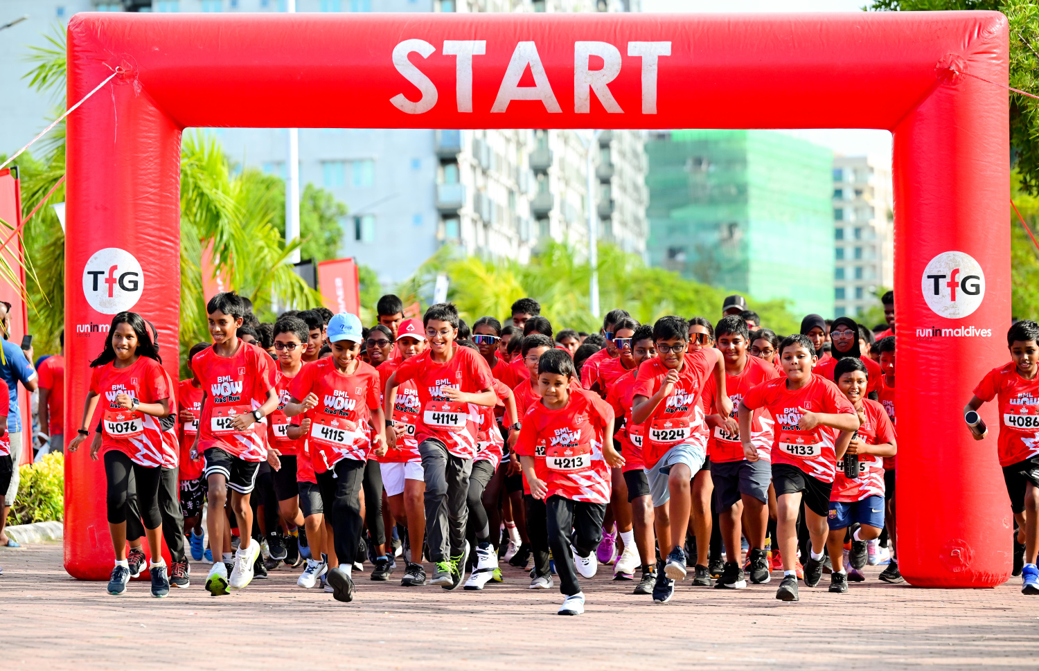 ބީއެމްއެލް އާއި ޓޯޓަލް ފިޓްނަސް ގްރޫޕް (ޓީއެފްޖީ) ގުޅިގެން މިއަދު ހުޅުމާލޭގައި ބޭއްވި ބީއެމްއެލް ވާއު ކިޑްސް ރަންގައި ބައިވެރިވި ދުވުންތެރިން.-- ފޮޓޯ: ނިޝާން އަލީ | މިހާރު