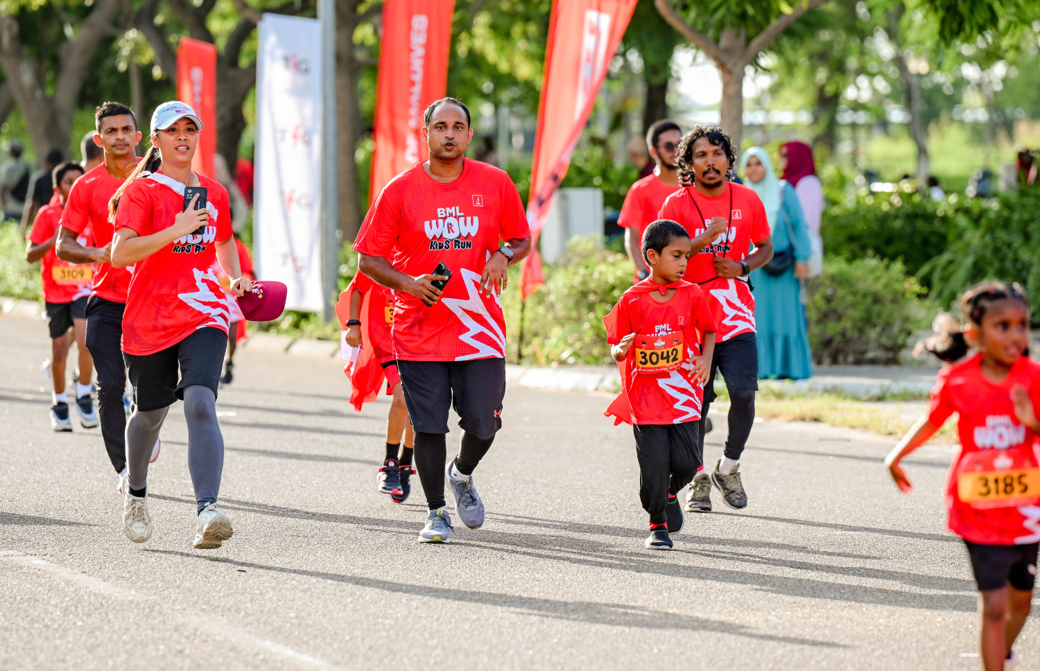 ބީއެމްއެލް އާއި ޓޯޓަލް ފިޓްނަސް ގްރޫޕް (ޓީއެފްޖީ) ގުޅިގެން މިއަދު ހުޅުމާލޭގައި ބޭއްވި ބީއެމްއެލް ވާއު ކިޑްސް ރަންގައި ބައިވެރިވި ދުވުންތެރިން.-- ފޮޓޯ: ނިޝާން އަލީ | މިހާރު