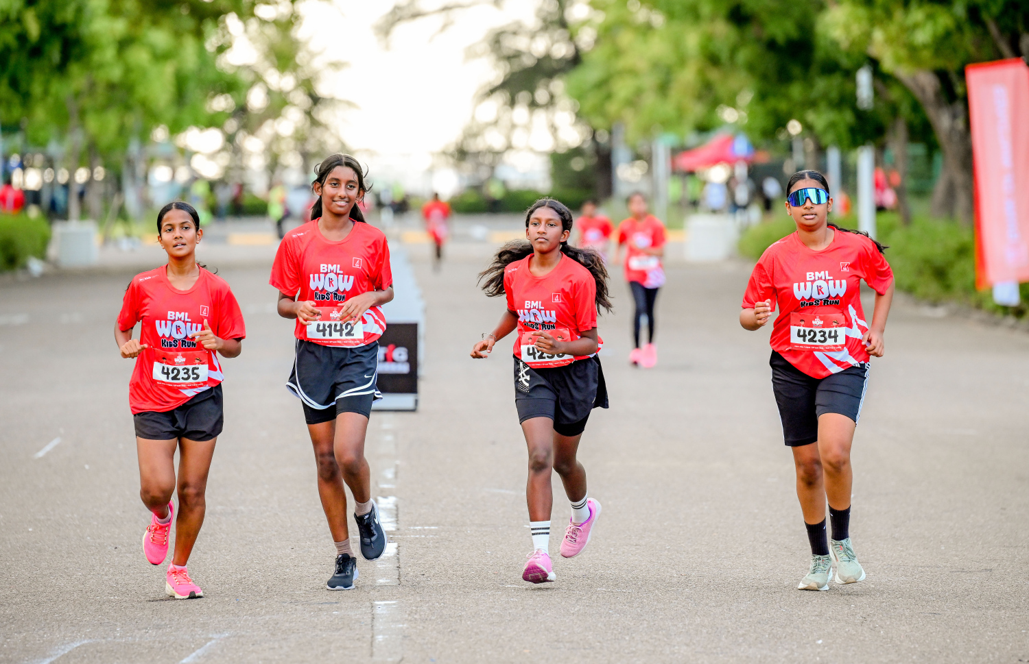 ބީއެމްއެލް އާއި ޓޯޓަލް ފިޓްނަސް ގްރޫޕް (ޓީއެފްޖީ) ގުޅިގެން މިއަދު ހުޅުމާލޭގައި ބޭއްވި ބީއެމްއެލް ވާއު ކިޑްސް ރަންގައި ބައިވެރިވި ދުވުންތެރިން.-- ފޮޓޯ: ނިޝާން އަލީ | މިހާރު