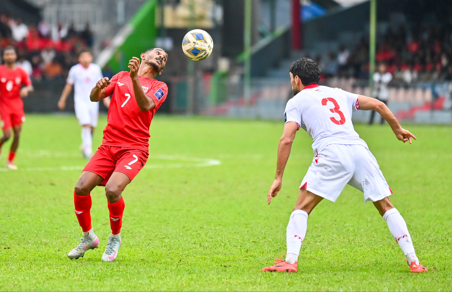 އޭޝިއަން ކަޕް ކޮލިފައިންގައި ރާއްޖެއާ ތަޖިކިސްތާން ބައްދަލުކުރި މެޗް --- މިހާރު ފޮޓޯ/ފަޔާޒް މޫސާ